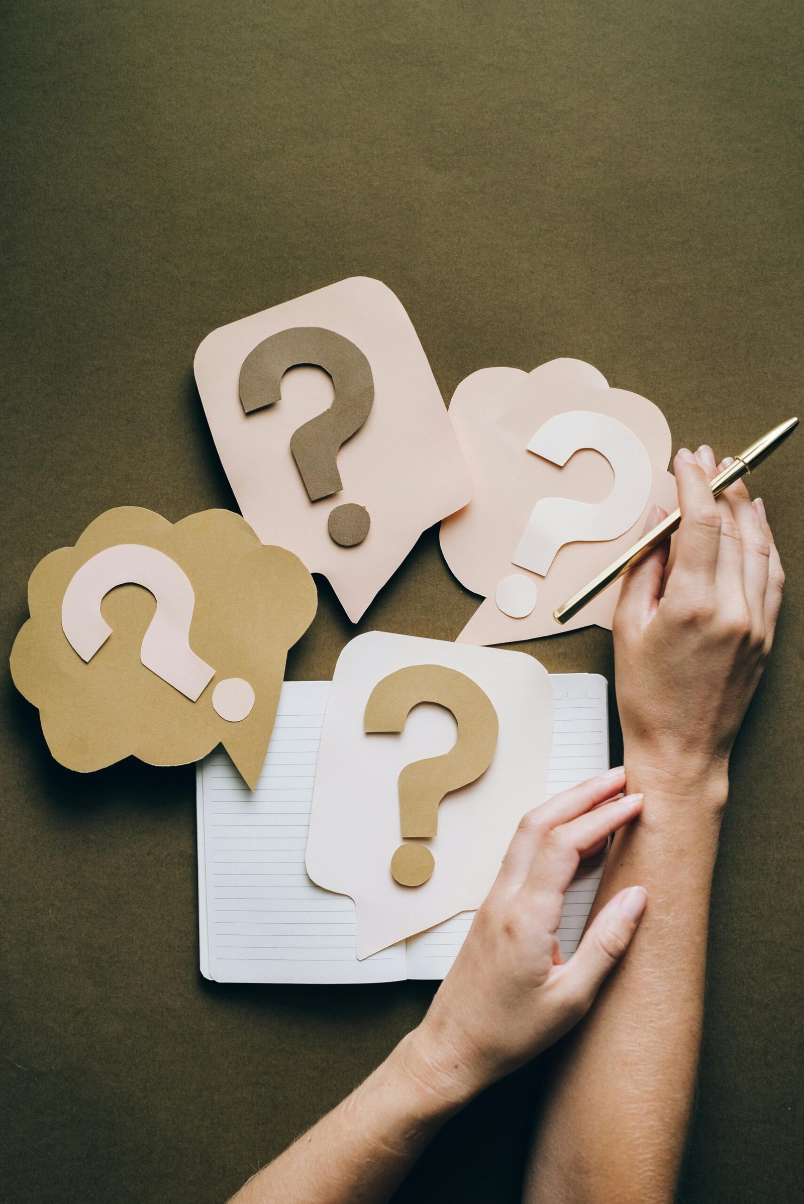 Multiple question mark speech bubbles representing unanswered health questions